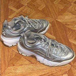Silver and white Fila sneakers